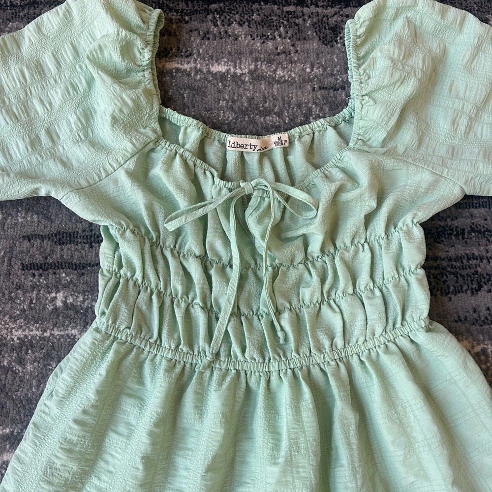 LIBERTY LOVE Pastel Green Tiered Smocked Dress With Puff Sleeves - Picture 3 of 9